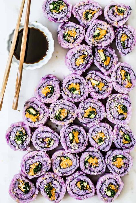 This gluten-free and vegan Spicy Sweet Potato Sushi is made with roasted sweet potatoes combined with vegan mayo and chili sauce for a taste and texture that resembles spicy tuna. Roll with massaged sesame oil kale liquid aminos and purple sweet potato rice, avocado. | www.healthylittlevittles.com Sweet Potato Sushi, Sushi Healthy, Sweet Potato Rice, Healthy Sushi, Sweet Potato Powder, Spicy Tuna Roll, Purple Sweet Potato, Potato Rice, Vegan Sushi