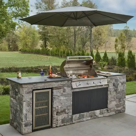 10 Best Outdoor Grill Station Ideas - DIYCozy: Nails, Decor, DIY, Gardening, Holidays Simple Outdoor Kitchen Blackstone, Umbrella Over Grill, Blackstone Outdoor Kitchen Ideas Diy, Diy Outdoor Grill Station, Pergula Ideas, Outdoor Grill Area Diy, Modern Outdoor Grills, Grill Station Ideas, Outdoor Grilling Station