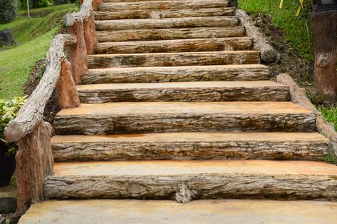 If you want to construct steps out of a dirt slope, all you need is an effective landscaping tool that is safe and easy to climb. It just takes a few hours one afternoon. How To Build Stairs Outdoors, Outdoor Stairs Hillside, Outdoor Steps On A Slope, Landscaping Tools, Garden Stairs, Outdoor Steps, Wooden Steps, Flat Stone, Porch Steps