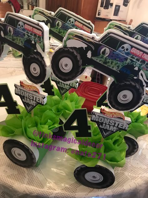 Monster jam centerpiece Follow me on instagram @ nata271 Monster Jam Centerpieces Ideas, Monster Truck Party Centerpieces, Monster Truck Birthday Centerpieces, Monster Truck Table Centerpiece, Monster Truck Centerpieces, Monster Truck Birthday Table Decor, Monster Truck Centerpieces Ideas, Monster Jam Centerpieces, Monster Jam Birthday Centerpieces