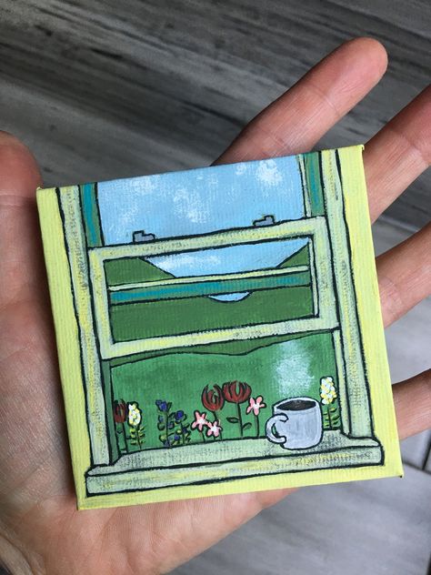 Hand-painted miniature canvas with a peaceful window looking out over beautiful fields, and some steaming coffee, of course! Easel INCLUDED️ Window Painting On Canvas, Easy Paintings Acrylic, Painting Ideas Coffee, Marker Drawings Easy, Funky Painting Ideas, Coffee Acrylic Painting, Tiny Canvas Art, Mini Canvas Art Ideas, 3 Canvas Painting