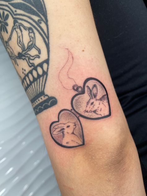 Locket Tattoos Simple, Bunny Fairy Tattoo, Year Of Rabbit Tattoo, Love Bunny Tattoo, Bunny Heart Tattoo, Heart Locket Tattoo Simple, Pet Locket Tattoo, Heart Frame Tattoo, Dog And Rabbit Tattoo