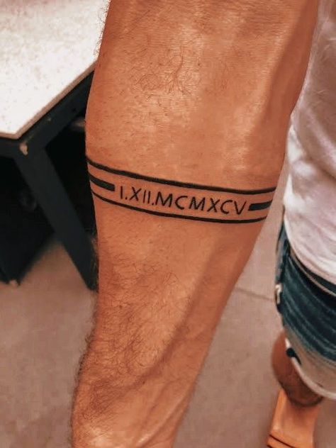 Simple Band Tattoos For Men, Forearm Tattoo Bands For Men, Roman Numeral Band Tattoo, Stripe Tattoo Arm Men, Forearm Tattoo Band, Tattoo Ideas For Men Arm Simple, Meaningful Armband Tattoos For Men, Men Forearm Tattoos Simple, Bicep Band Tattoo Men