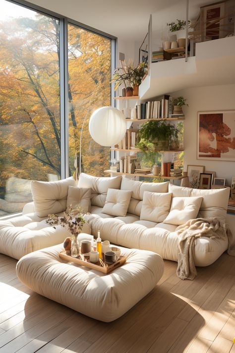 Step into a dreamlike atmosphere with this white sectional sofa taking the spotlight in a maximalist living room. The design is inspired by nature, with a warm color palette and soft atmospheric lighting creating a cozy, inviting space. The golden light and light beige tones add a touch of elegance, while the blurred, dreamlike atmosphere evokes a sense of tranquility and harmony with nature. Beige Couch Living Room, Nature Inspired Living Room, Sofa Fabrics, Maximalist Living Room, Japandi Interiors, Cozy Living Room Design, Living Room Warm, White Couches, Beige Living Rooms