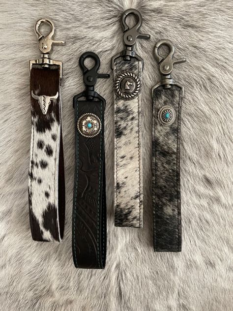 Cowhide Keychain Diy, Cowgirl Gift Ideas, Cowhide Crafts Diy Ideas, Cow Hide Projects, Western Keychain Ideas, Cowgirl Keychains, Cowhide Projects, Cowhide Diy, Western Keychains