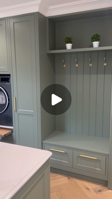 Trevor McDonnell Kitchens on Instagram: "The utility room at the “ Brookhill house project “ 
.
.
.
We love the boot bench and the raised washer & dryer in this utility room. it made life for our clients so functional 
.
.
A green utility room with raised washing machine and dryer combines practicality with a fresh, vibrant aesthetic. The green color palette, ranging from soft sage to rich emerald, infuses the space with a sense of calm and connection to nature.

The washing machine and dryer are elevated on sturdy platforms, making them easily accessible without the need to bend down, which enhances ergonomic convenience. These platforms often include built-in storage drawers underneath, perfect for housing laundry detergents, fabric softeners, and other cleaning supplies.

Cabinetry in c Elevated Laundry Washer And Dryer, Side Extension Utility Room, Sage Green Utility Room, Laundry Room Sage Green, Laundry Room Green Cabinets, Raised Washing Machine, Raised Washer Dryer, Green Cabinets Laundry Room, Green Utility Room