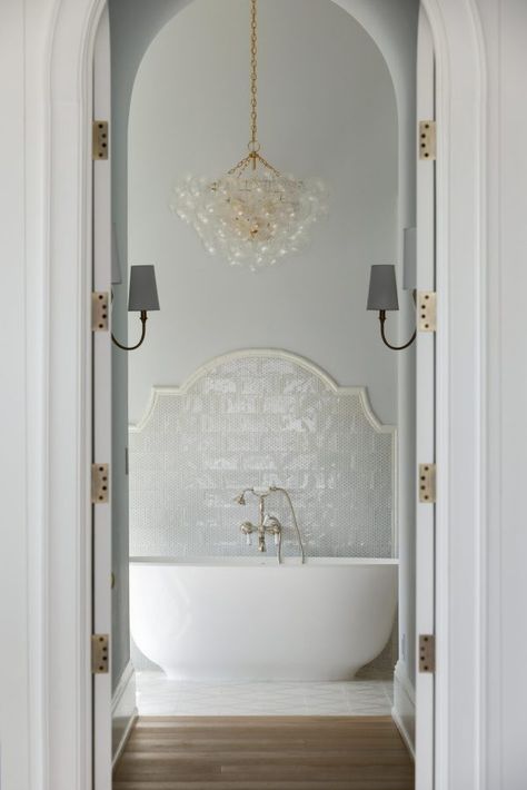 Bathroom chandelier over tub