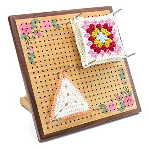 A wooden blocking board like this one is a great way to block smaller pieces, like granny squares or hexagons. The metal pins keep the corners of the squares straight as they dry, so they'll be much easier to seam together later.We like this wooden blocking board set, which comes with a set of smooth stainless steel pins. Crochet Blocking, Crochet Blocking Board, Crochet Box Stitch, Crochet Bralette Pattern, Knitting Blocking, Stainless Steel Rod, Crochet Lovers, Steel Rod, Granny Squares