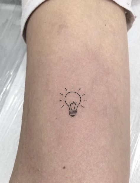 The Best 100 First Tattoo Ideas - TheTatt Light Worker Tattoo Ideas, Light Bulb Tattoo Design, Tiny Teacher Tattoo, Lightbulb Heart Tattoo, Tattoo Ideas Teacher, Lightbulb Tattoo Ideas, Teacher Tattoos For Women, Small Lightbulb Tattoo, My Light Tattoo