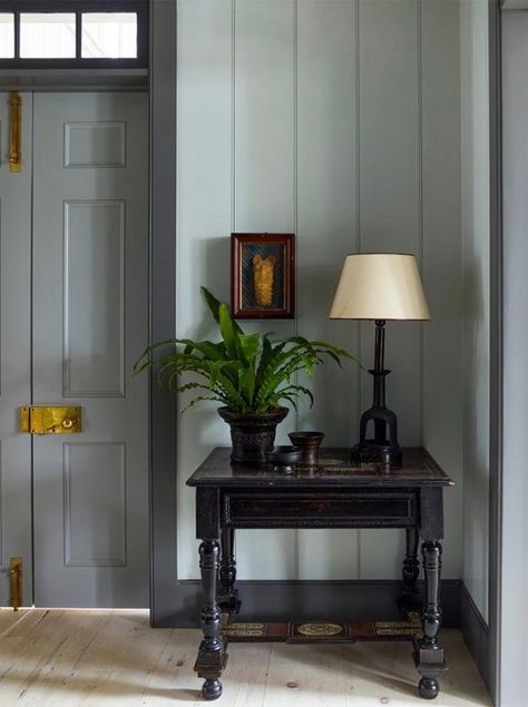 steven-gambrel-sag-harbor-home-42howard-street-foyer-entry-grey-door-brass-hardware-wood-floors-potted-fern-table - Katie Considers Steven Gambrel, Grey Doors, Occasional Seating, Sag Harbor, Entry Way, Empty Wall, Comfy Chairs, Entry Foyer, Door Styles