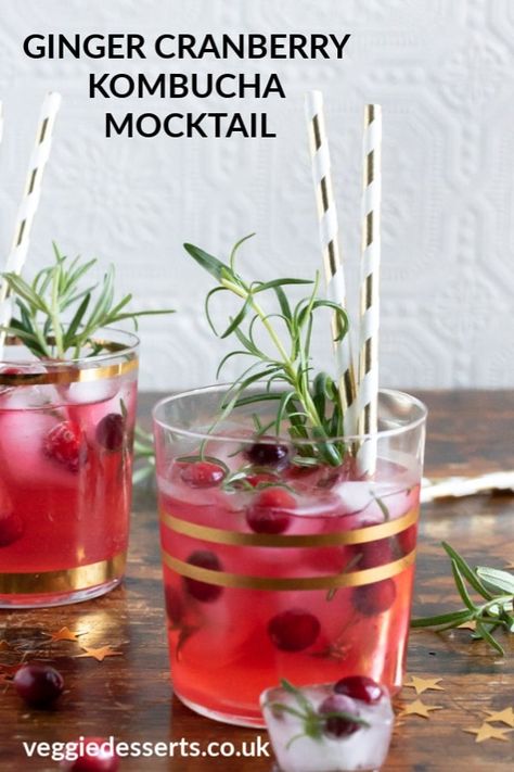 This Kombucha mocktail is a tasty non-alcoholic cocktail that's perfect for the holidays. It brings healthy kombucha together with festive cranberry juice and a bit of fiery ginger ale. For a bit of extra pizzazz, I've make some simple cranberry and rosemary ice cubes to make these mocktails extra special.  #kombucha #mocktail #christmascocktail #christmasmocktail #newyearsevecocktail #nonalcoholic Rosemary Ice Cubes, Kombucha Mocktail, Cranberry Kombucha, Kombucha Cocktail, Veggie Desserts, Christmas Mocktails, Vegan Drinks Recipes, Homemade Kombucha, Kombucha Recipe