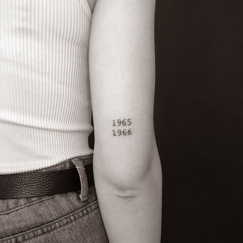 Type Writer Font Tattoo Number, Year Tattoo Number Arm, Tattoo Numbers Ideas, Parents Birth Year Tattoo, Tattoos Above Elbow, Number Fonts For Tattoos, Birthdate Tattoos, Number Tattoo Design, Birthyear Tattoo