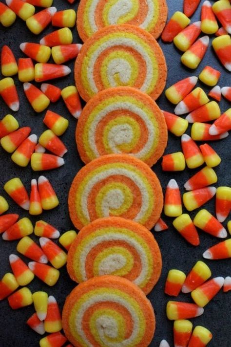 Halloween: Candy Corn Desserts and Candy Corn Crafts.  Gearing up for Halloween and want some classic Halloween treats?  I'm sharing some amazingly delicious candy corn desserts as well as some fantastic Candy corn crafts! #parties #holiday #halloween #candycorn #baking #diy #crafts #partyideas Halloween Candy Corn Cookies, Candy Corn Sugar Cookies, Candy Corn Recipe, Corn Cookies, Pasteles Halloween, Swirl Cookies, Candy Corn Cookies, Postres Halloween, Halloween Cookie Recipes