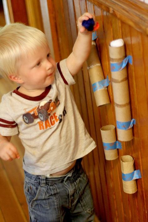 This simplistic activity works on so many motor skills! Add tongs, vary the size pompoms, add "catch" bags at the bottom of each, vary height and attach to a bulletin board for an awesome fine motor station