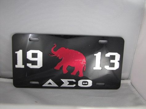 Delta Sigma Theta License Plate. Black Background, red elephant and Mirror numbers. Kimberly Foster, Mirror Letters, Nursing License, Greek Paraphernalia, Red Elephant, Silver Numbers, Delta Sigma Theta, My Dream Car, Friend Birthday