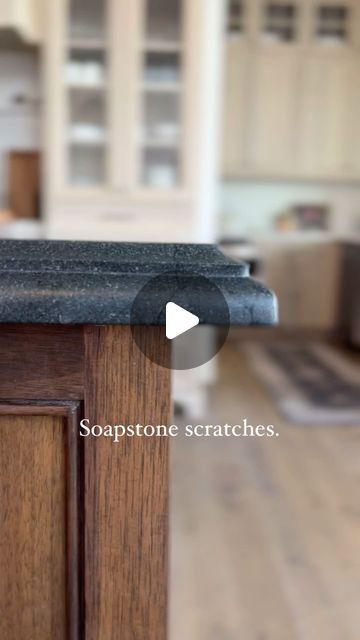 Andrea Nelson | Home Decor | Interior Decorating on Instagram: "It cost less, too. 🖤 I’ll tell you EXACTLY what we chose to mimic the look of soapstone while avoiding all of the problems that come with most soapstone countertops. 👇

HERE’S WHY:

When we were building our home, I knew I wanted a dark countertop paired with dark wood for our kitchen island, with lighter perimeter cabinets and countertops, and my heart was 100% set on beautiful SOAPSTONE. 

But as I researched, saw photos online, read horror stories, and saw images of chipped, scratched, dented, discolored soapstone… my heart sank. I appreciate patina… but this seemed to go beyond that. 

I understand there are some soapstones that hold up better than others, but still… I didn’t want to have to potentially worry or fuss ove Soapstone Countertops White Cabinets, Soapstone Countertops Wood Cabinets, Soapstone And Marble Kitchen, Soapstone Island Countertop, Black Soapstone Countertops Kitchen, Grey Soapstone Countertops, Dark Wood Kitchen Island, Kitchen With Soapstone Countertops, Soapstone Kitchen Countertops