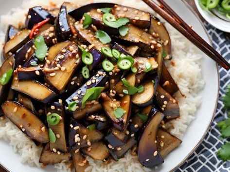 Spicy Szechuan Eggplant Stir-Fry: Quick & Flavorful Recipe - NewsBreak Asian Eggplant Recipes Stir Fry, Spicy Eggplant Stir Fry, Chinese Style Eggplant Recipe, Thai Eggplant Stir Fry, Szechuan Eggplant, Buffalo Chicken Pizza Recipe, Eggplant Stir Fry, Copeland’s Eggplant Pirogue, Baked Teriyaki Salmon