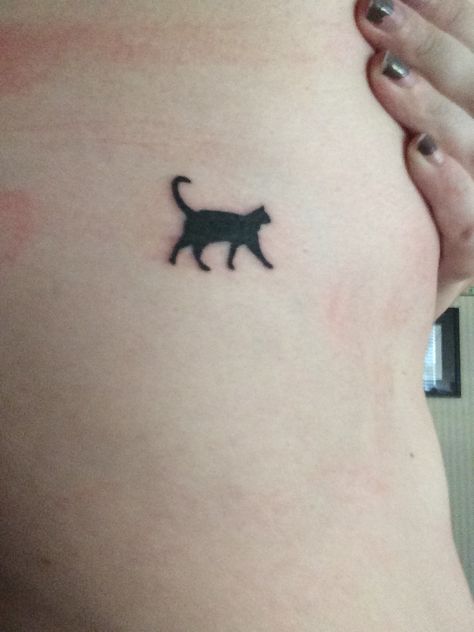 Simple, small cat tattoo Black Cat Small Tattoo, Dainty Black Cat Tattoo, Black Cat Fine Line Tattoo, Small Black Cat Tattoo Simple, 2 Cats Tattoo Simple, Subtle Cat Tattoo, Tattoos For Your Cat, Small Cat Tattoo Simple, 3 Cat Tattoo