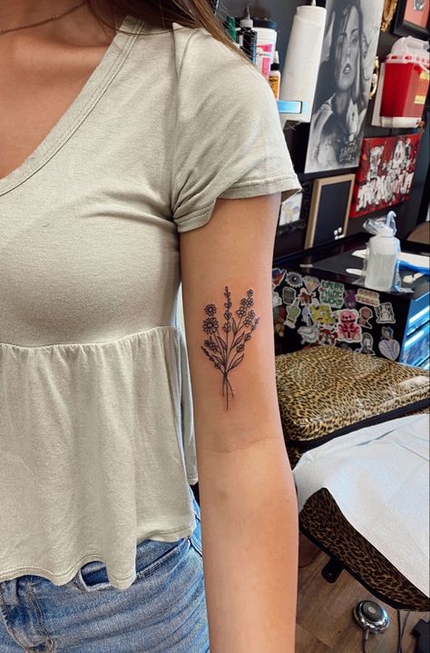 Flower Tattoo Front Of Arm, Floral Tattoo Design Bicep, Tattoo Ideas Bicep Women, Bicep Tattoo Flower, Dainty Bicep Tattoo, Inside Of Bicep Tattoo Women, Tattoos On Bicep Women, Bicep Flower Tattoo Women, Woman Bicep Tattoo