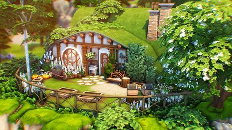 The Sims 4 Hobbit hole / Hobbit house Sims 4 Magic House, Hobbit Holes, Sims 4 Cottage, Casa Hobbit, Sims 4 Speed Build, Magical House, Build Inspiration, Sims 4 House Building, Sims 4 House Plans