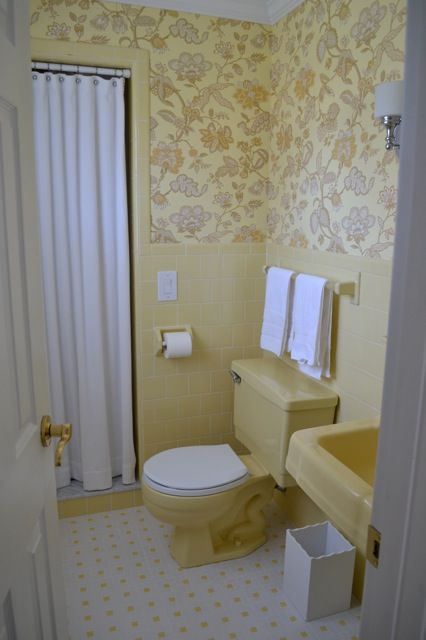 RE: Dated yellow tile bathroom. Before you get rid of that dated tile that's in perfect condition, consider a restoration instead of a replacement!  A little bit of wallpaper, updated light fixtures, bright white curtains, and crown moulding can work wonders!   @meashyc Yellow Tile Bathroom Ideas Vintage, Tiny Yellow Bathroom Ideas, Pale Yellow Bathroom Tile, Pale Yellow Tile Bathroom, 70s Yellow Bathroom, Vintage Yellow Tile Bathroom, Light Yellow Bathroom, Pale Yellow Bathroom, Pale Yellow Bathrooms