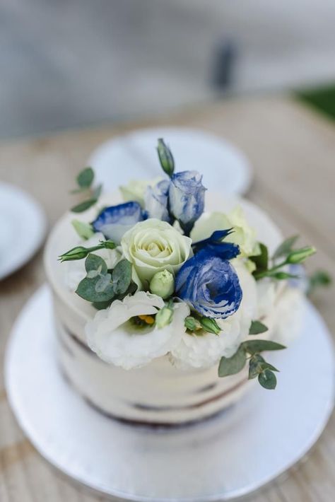 White And Blue Engagement Cake, Simple White And Blue Wedding Cake, Blue Bridal Shower Cake, Blue And White Bridal Shower Cake, White Cake With Blue Flowers, Simple Wedding Cake Blue And White, Simple Wedding Cake Blue Flowers, Blue Cake With Daisies, Pale Blue And White Wedding Cake