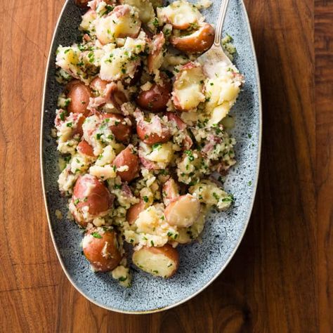 Crushed Red Potatoes with Garlic and Herbs | Cook's Country Crushed Red Potatoes, Red Potatoes Recipe, Cooks Country, Cooks Country Recipes, Donut Toppings, Cookie Toppings, Country Recipes, America's Test Kitchen Recipes, Herb Recipes