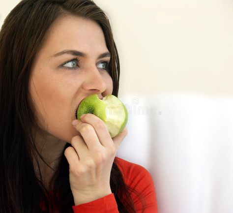 Woman with apple. Woman eating an apple #Sponsored , #sponsored, #paid, #apple, #eating, #Woman Rotten Apple, Woman Eating, Apple Stock, Art Geometric, Apples, Stock Images Free, Graphic Art, Stock Images, Gif