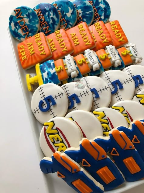 7th Birthday Themes For Boys, Boy 9th Birthday Party Themes, 6 Year Birthday Party Ideas Boy, Nerf Cookies Decorated, 6th Birthday Boy Theme, Nerf Cakes For Boys, Nerf Cookies, Boys Nerf Birthday Party, Nerf Birthday Party Ideas Food