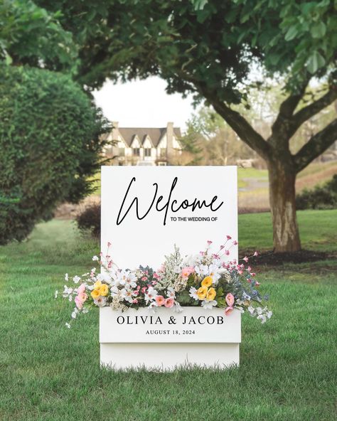 Warmly welcome your guests with our elegant, handmade Flower Box Welcome Sign. Make a memorable first impression with this beautiful and unique greeting accessory.  Dimensions: - Sign Width: 24 inches - Sign Height: 36 inches - Flower Box Outside Dimensions: 24x6x4 - Flower Box Inside Dimensions: 23.5 x 5.5 x 3.5  This listing is for the one flower box sign. No other decor is included. Matching Seating Chart: https://www.etsy.com/listing/1698850951/wedding-seating-chart-personalized *HI, AK, Pue Flower Wall Seating Chart Wedding, Welcome Sign Garden Wedding, Wedding Flower Box Sign, Wedding Welcome Flower Box Sign, Ceremony This Way Sign, Flower Welcome Sign Wedding, Welcome Wedding Sign With Flowers, August Wedding Decorations, Wedding Welcome Sign Mirror With Flowers