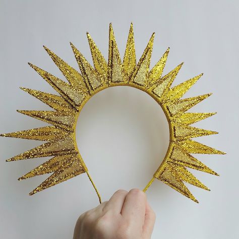 Glitter gold sun crown  Sun goddess costume Christmas sun headpiece  Celestial gold sun headband  Festival gold  halo crown  Halloween sun headdress  Other Holiday headbands  https://www.etsy.com/shop/DekorLiuSy?ref=seller-platform-mcnav&section_id=23780040 The accessory is made by hand from glitter eva foam. It is soft and lightweight material. At the base is a metal hairband of standard size. Sun Headdress, Sun Headpiece, Sun Halo Crown, Sun Goddess Costume, Sun Headband, Celestial Headpiece, Sun And Moon Costume, Goddess Headdress, Sun Halo