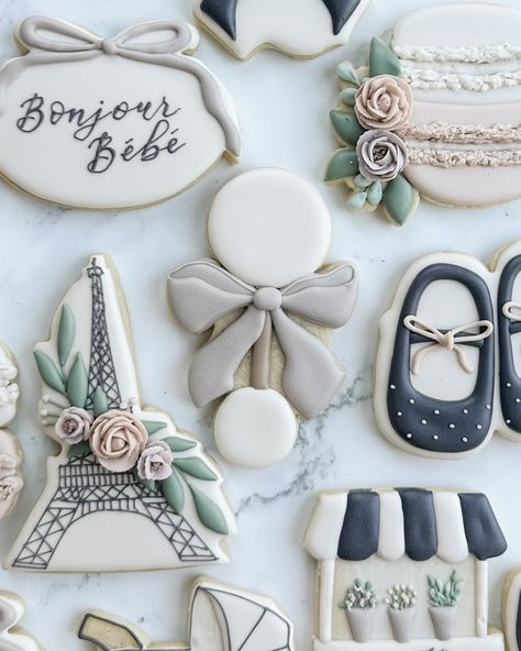 I absolutely am obsessed with all the French themes lately! I had a request for a set back in February and suddenly I’ve had it requested over and over again. It’s so sweet and I love the neutral colors mixed with the ivory and black. Bouquet cutter is from @maisonscustomcookies and the rest are my designs. 💗 . #pariscookies #frenchcookies #frenchbabyshower #bonjourbaby #babyshowercookies #babycookies #bowcookies #floralcookies #royalicingflowers #royalicingcookies #sugarcookies #sugarcookie... French Themed Cookies, Paris Cookies, French Baby Shower, Black Bouquet, French Cookies, Royal Icing Flowers, French Theme, Themed Cookies, Baby Cookies