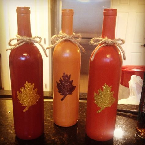 Fall decorating with wine bottles Thanksgiving Bottle Decorations, Fall Painted Wine Bottles, Fall Wine Bottle Crafts Diy, Decorating With Wine Bottles, Crafts With Wine Bottles, Thanksgiving Wine Bottle, Fall Wine Bottles, Wine Bottle Project, Thanksgiving Wine