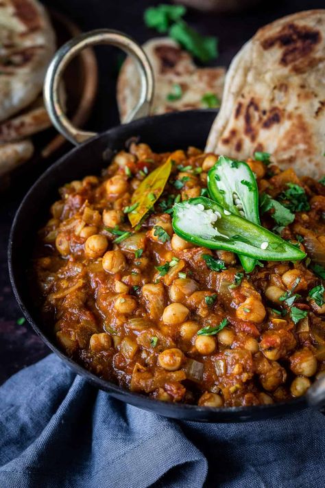 Chana masala - this easy vegan chickpea curry is quick and simple to make and full of flavour. It is made using mostly storecupboard ingredients so is perfect for when you are low on supplies! #veganmeal #plantbased #healthy Chana Masala Recipe Easy, Vegan Chana Masala, Dinner Recipes Indian, Chana Masala Recipe, Vegan Chickpea Curry, Vegan Curry Recipes, Vegan Indian Recipes, Vegan Chickpea, Meatless Main Dishes