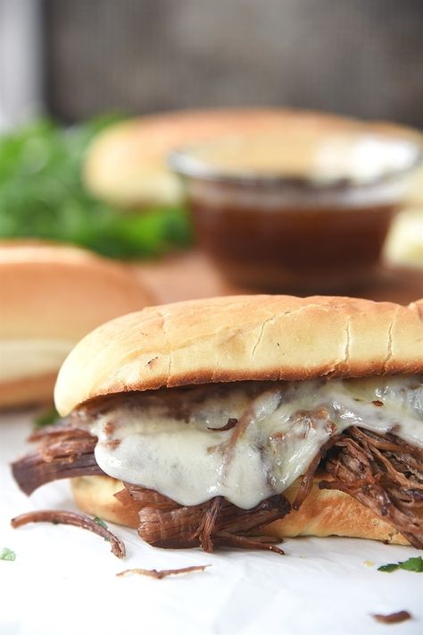 French Dip Sandwiches made in the Instant Pot are a perfect way to put together a quick and easy dinner that's delicio French Dip With Au Jus, Aus Jus, Chinese Braised Beef, Crockpot French Dip, Roast Beef Crock Pot Recipes, French Dip Sandwich Crockpot, Instant Pot French Dip, Crockpot Roast Recipes, French Dip Sandwiches