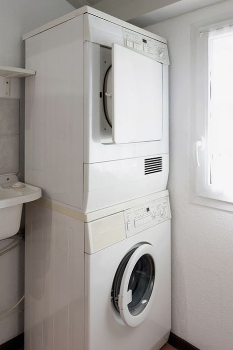 Maximizing space in your laundry area often means stacking your washer and dryer. If you find yourself without a stacking kit, don't worry. This article offers a comprehensive step-by-step guide on how to safely stack your washer and dryer without one, ensuring you can enjoy the benefits of a space-saving layout with peace of mind. Stacking Washer And Dryer, Ventless Dryer, Kitchen Cabinets And Countertops, Laundry Room Layouts, Washing Machine And Dryer, Laundry Area, Interior Decorating Styles, Electrical Panel, Front Load Washer