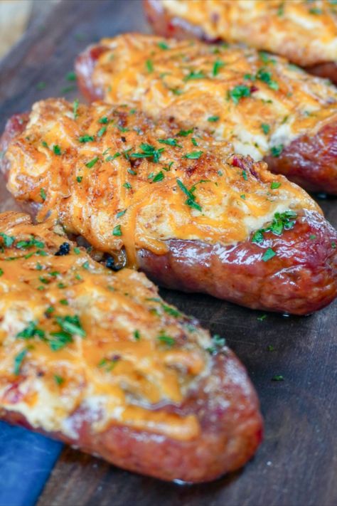 Looking for a fun and tasty snack? Then you must try these viral sausage popper boats. Savory, cheesy and smokey, they are a must have. Bariatric Lunch, Traeger Smoker Recipes, Stuffed Sausage, Wood Fire Grill, Grill Nation, Smoker Grill Recipes, Sausage Appetizers, Black Stone Recipes, Sausage Wrap