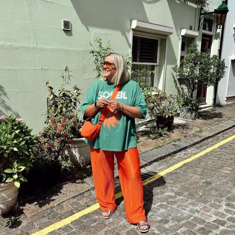 @sophieclairecurvy the queen of colour blocking 🥰 Our orange plisse trousers do come with a matching top for a dressier look but we love how soph has styled it for casual exploring vibes! Orange Trousers Outfit, Top And Trousers Outfit, Orange Trousers, Trousers Outfit, Trouser Outfit, Colour Blocking, Matching Top, Work Outfits, Style Icon