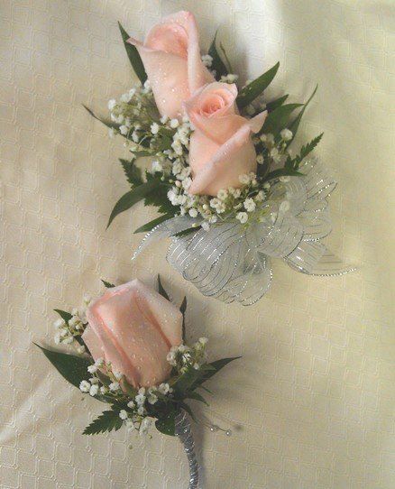 Pink rose corsage and boutonniere set from Floral Fashions Carnation Corsage And Boutonniere, Simple Corsage And Boutonniere, Pink And White Corsage And Boutonniere, Corsage And Boutonniere Set Pink, Prom Corsage And Boutonniere Pink, Light Pink Corsage And Boutonniere, Baby Pink Corsage, White And Pink Corsage, Simple Corsage Prom