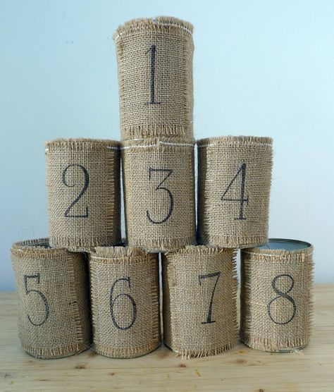 Upcycled tin can table number and cutlery holders Fall Festival Booth, Pub Interior Ideas, Courtyard Cafe, Banquet Centerpieces, Upcycle Table, Recycling For Kids, Diy Table Numbers, Pub Interior, Event Decorating