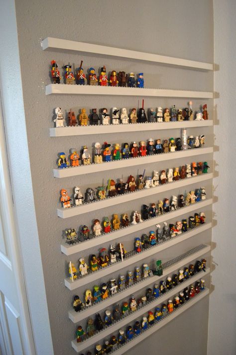 Very cool!!! However, it would probably be easier and safer for the wall to create the shelving as one piece vs individual shelves as it appears here.                           * think smarter, not harder * Lego Shelf, Lego Bedroom, Lego Organization, Lego Wall, Lego Display, Lego Room, Lego Storage, Lego Minifigure, غرفة ملابس