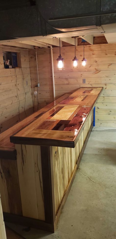 This is another Ambrosia Maple bar I built at my son's house. It's trimmed out with walnut around the edges. The top is made from a lot of cutoffs from my shop. Then it was covered in epoxy. L Shape Bar, Wood Bar Top, Live Edge Bar, L Shaped Bar, Custom Home Bars, Maple Bars, Oak Table Top, Home Pub, Wooden Garage