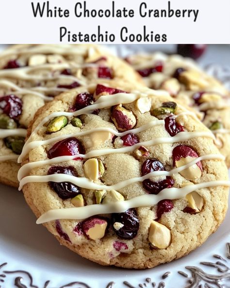 White Chocolate Cranberry Pistachio Cookies Sweet, crunchy, and festive! These cookies are perfect for the holidays. Ingredients: 1 cup (2 sticks) unsalted butter, softened 1 cup granulated sugar 1/2 cup brown sugar, packed 2 large eggs 2 tsp vanilla extract 3 cups all-purpose flour 1 tsp baking soda 1/2 tsp salt 1 cup dried cranberries 1 cup chopped pistachios 1 cup white chocolate chips (plus extra for drizzling) Directions: Preheat your oven to 350°F (175°C). Line a baking sheet with ... Cranberry White Chocolate Pistachio Cookies, Grinch Butter Cookies, Pistachio Sugar Cookies, Cranberry Pistachio Shortbread Cookies, Cranberry Pistachio Cookies, Joy Cookies, Grinch Cookies, Almond Joy Cookies, Chocolate Cranberry