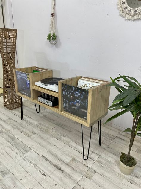 "This Record LP Storage / Vinyl Record Holder unit is READY TO SHIP and is the actual unit listed in the photo.  * Model: turntable and receiver stand * Length: 50\"  * Depth: 14\" * Legs: 16 \"hairpin  * total height: 30.5 \" * Stain: weather oak  * Finish: Gloss  Retail price $575 Discount 25% off retail , ready to ship price : $431.25 Please message us if you have any questions. We can add cable holes if needed. It will ship within three days of being ordered." Vinyl Record Holder, Turntable Stand, Lp Storage, Vinyl Record Storage, Record Holder, Record Storage, Weathered Oak, Oak Color, Solid Wood Furniture