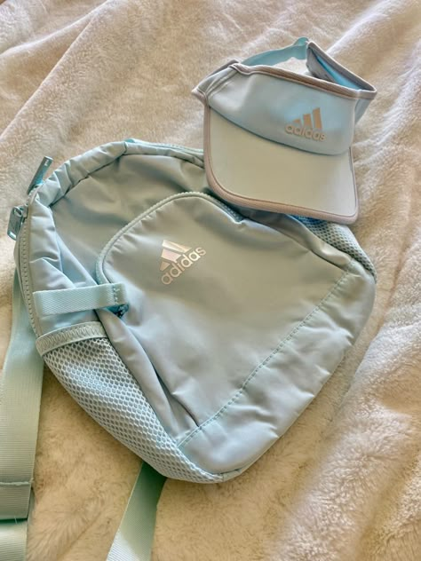 Light blue adidas backpack and visor Nike School Backpacks, Light Blue Adidas, Adidas Bag Backpacks, Adidas Bag, Nike Backpack, Adidas Backpack, Aesthetic Backpack, Adidas Bags, Aesthetic Light