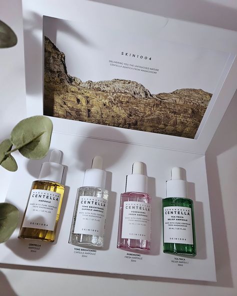 Discover the Power of Centella Asiatica with SKIN1004's Madagascar Centella Ampoule Kit!💖 This incredible kit features four powerful serums, each designed to target specific skin concerns. Included in the Kit: 🩷Poremizing Fresh Ampoule: Perfect for oily skin, this serum helps to minimize the appearance of pores and control excess sebum. 🤍Tone Brightening Capsule Ampoule: Deeply hydrates the skin, leaving it looking radiant and healthy. 💚Tea-Tree Calming Ampoule: Soothes irritated skin and... Skin 1004 Ampoule, Madagascar Centella Ampoule, Centella Ampoule, Healthy Tea, Skin Care Basics, Madagascar Centella, Skin Concern, K Beauty, Vitamins And Minerals