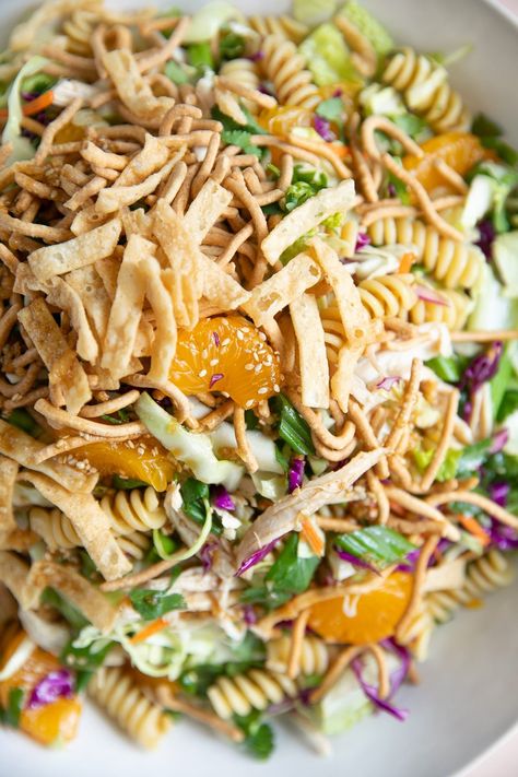 This Asian Pasta Salad Recipe with Chicken is fresh, crunchy, and utterly irresistible. Filled with juicy chicken, fried wontons, crunchy greens, sweet mandarins, and the very best Asian sesame vinaigrette, it's easy to enjoy this Asian Pasta Salad as a satisfying lunch or light dinner. Asian Pasta Salad Recipes, Salad Recipe With Chicken, Asian Pasta Salad, Spaghetti Pasta Salad, Asian Pasta Salads, Asian Pasta, Summer Pasta Salad Recipes, Recipe With Chicken, Cold Pasta Salad Recipes