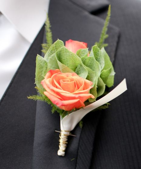 Orange Rose With Bells of Ireland Boutonniere with orange spray roses and bells of ireland designed in your choice of colors and, ribbon, and accents. Colors may vary and be changed to coordinate with your suit or tuxedo. Bells Of Ireland Wedding, Pink Rose Boutonniere, Orange Boutonniere, Bells Of Ireland, Homecoming Corsage, Rose Boutonniere, Prom Flowers, Orange Wedding, Orange Roses