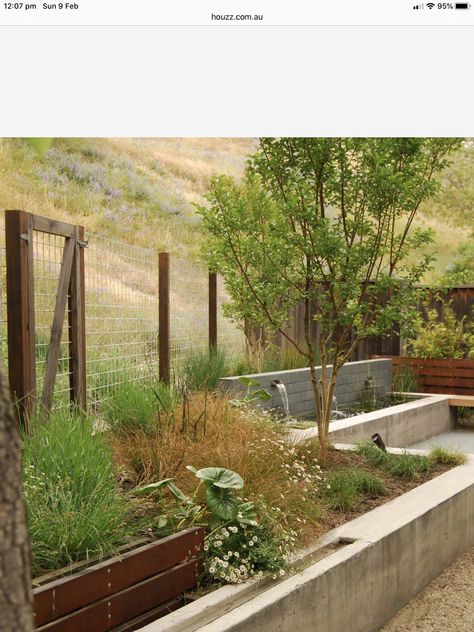 Front Yard Deer Fence, Mountain Fence Ideas, Deer Fencing Ideas, Woodland Fence, Mow Strip Under Fence, Garden With Deer Fence, Fence For Hilly Yard, Garden Fence For Deer, Field Fence