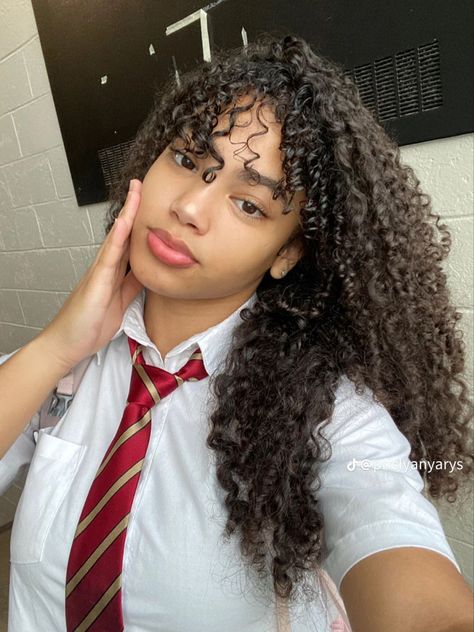 Woman with long brown curly hair at school 
#curlyhair #curlyhaircare #curlyhaircut #curlyhairstyle Curly Hair Curtain Bangs, Indian Wavy Hair, Curly Hair Care Products, Hair Curtain Bangs, Fit Bodies, Curly Hair Products, Fancy Makeup, Beauty Standards, Curly Hair Care